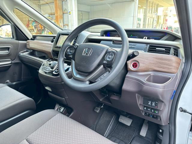 フリードハイブリッド ハイブリッド・G ★ユーザー買取★純正ナビ(VXM-234VFi)★フルセグTV★Rカメラ★両側パワースライド★ホンダセンシング★スマートキー★シートヒーター★Fエアロ★トランクスポイラー★ETC★前後ドラレコ★(15枚目)