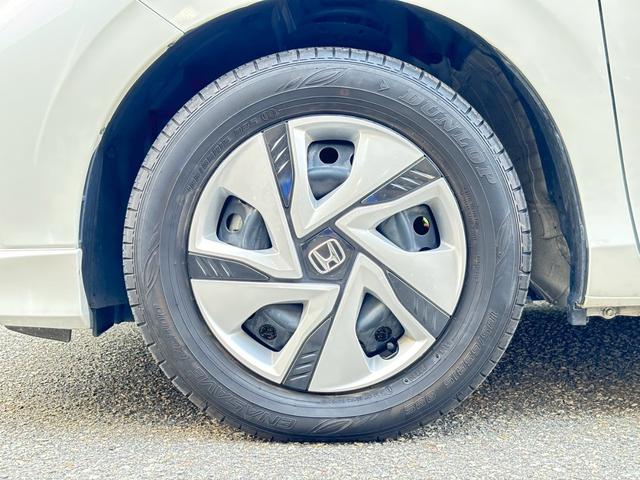 フリードハイブリッド ハイブリッド・G ★ユーザー買取★純正ナビ(VXM-234VFi)★フルセグTV★Rカメラ★両側パワースライド★ホンダセンシング★スマートキー★シートヒーター★Fエアロ★トランクスポイラー★ETC★前後ドラレコ★(65枚目)