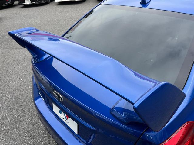 WRX STI STI 大型リアスポイラー アドバンスドセイフティパッケージ リアビークルディテクション 純正SDナビ サイド&バックカメラ 禁煙車 HSK製マフラー HKS製車高調 パワーシート 純正18インチAW(3枚目)