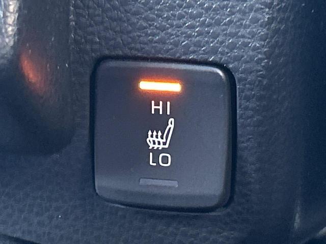 カローラスポーツ ハイブリッドG Z TRDフルエアロ 禁煙車 プリクラッシュセーフティ 純正ディスプレイオーディオ バックカメラ シートヒーター レーダークルーズ ETC 革巻きハンドル 純正18インチアルミ スマートキー(7枚目)