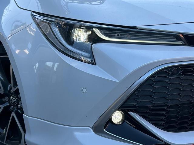 カローラスポーツ ハイブリッドG Z TRDフルエアロ 禁煙車 プリクラッシュセーフティ 純正ディスプレイオーディオ バックカメラ シートヒーター レーダークルーズ ETC 革巻きハンドル 純正18インチアルミ スマートキー(13枚目)
