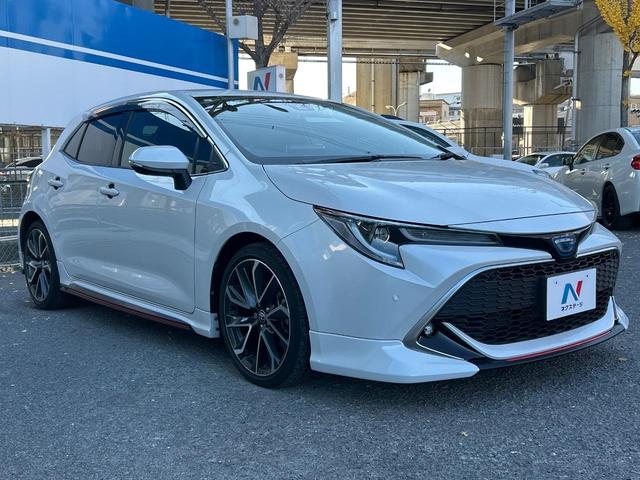 カローラスポーツ ハイブリッドG Z TRDフルエアロ 禁煙車 プリクラッシュセーフティ 純正ディスプレイオーディオ バックカメラ シートヒーター レーダークルーズ ETC 革巻きハンドル 純正18インチアルミ スマートキー(17枚目)