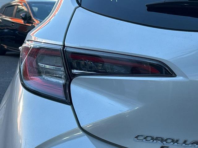 カローラスポーツ ハイブリッドG Z TRDフルエアロ 禁煙車 プリクラッシュセーフティ 純正ディスプレイオーディオ バックカメラ シートヒーター レーダークルーズ ETC 革巻きハンドル 純正18インチアルミ スマートキー(28枚目)