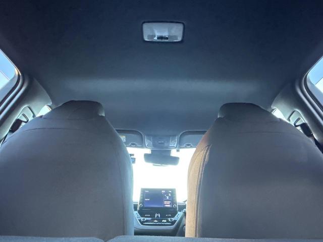 カローラスポーツ ハイブリッドG Z TRDフルエアロ 禁煙車 プリクラッシュセーフティ 純正ディスプレイオーディオ バックカメラ シートヒーター レーダークルーズ ETC 革巻きハンドル 純正18インチアルミ スマートキー(31枚目)