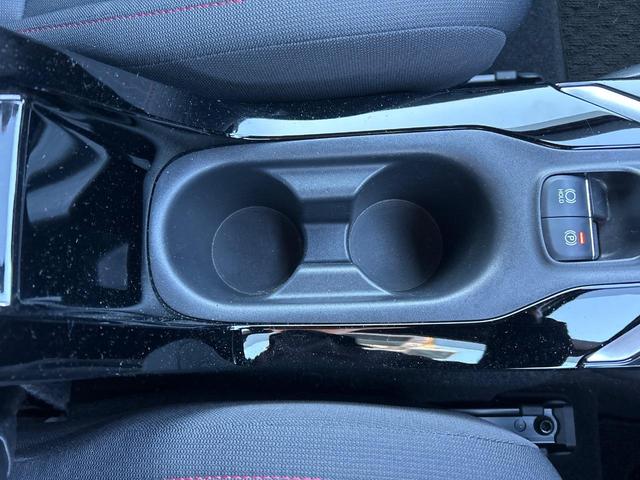 カローラスポーツ ハイブリッドG Z TRDフルエアロ 禁煙車 プリクラッシュセーフティ 純正ディスプレイオーディオ バックカメラ シートヒーター レーダークルーズ ETC 革巻きハンドル 純正18インチアルミ スマートキー(63枚目)