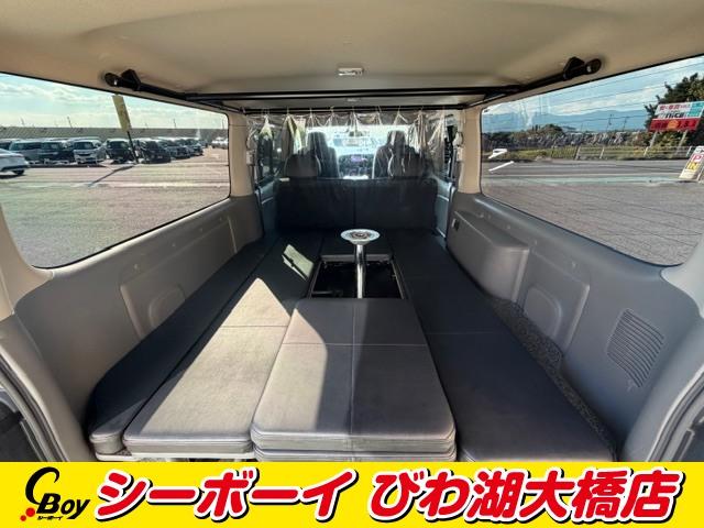 NV350キャラバンバン ロングライダープレミアムGXターボプロスタイルパック ワンオーナー ディーゼル ベッドキット 全方位カメラ 寒冷地仕様 クロスエイト17インチAW 純正7インチナビ フルセグ ETC ホワイトレター ブラックカプロンシート LEDヘッド(14枚目)