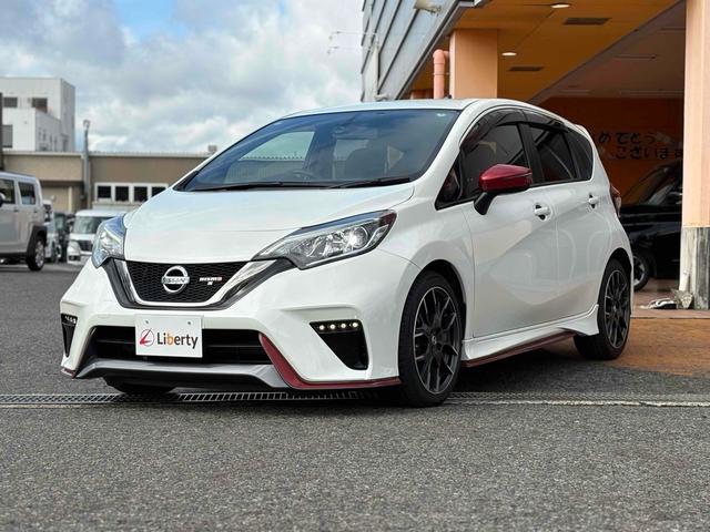 ノート ニスモ S ETC アルミホイール LEDヘッドランプ スマートキー 電動格納ミラー MT 盗難防止システム 衝突安全ボディ ABS ESC ミュージックプレイヤー接続可 エアコン パワーステアリング(15枚目)