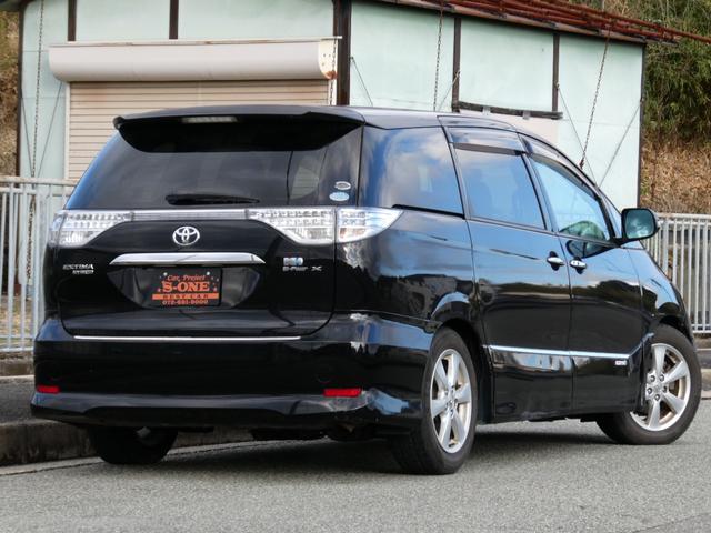 エスティマハイブリッド Ｘ　モデリスタエアロ／両側パワースライド／リアフリップダウンモニター／クルーズコントロール／フルセグＴＶ／ＥＴＣ／ＨＩＤ／プッシュスタート／７人乗り／４ＷＤ／ハイブリット（3枚目）