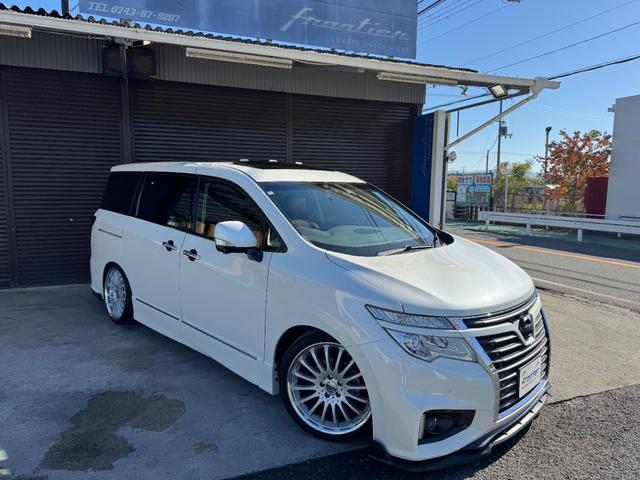 エルグランド ２５０ハイウェイスター　カールソン２０インチホイール　ＴＥＩＮ車高調　インパル４本出しマフラー　ヴァレンティＬＥＤテール　純正ナビ　電動フリップダウンモニター　ツインサンルーフ　両側パワースライドドア　アラウンドビュー（24枚目）