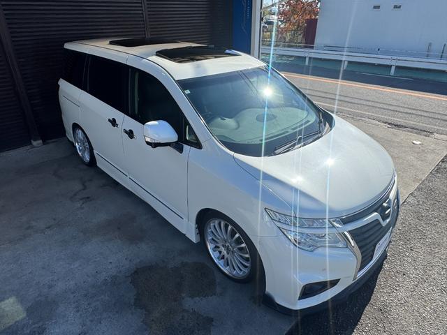 エルグランド ２５０ハイウェイスター　カールソン２０インチホイール　ＴＥＩＮ車高調　インパル４本出しマフラー　ヴァレンティＬＥＤテール　純正ナビ　電動フリップダウンモニター　ツインサンルーフ　両側パワースライドドア　アラウンドビュー（64枚目）