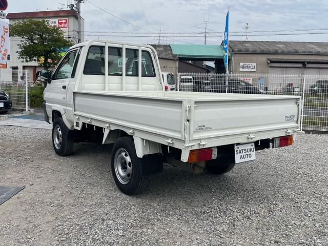 タウンエーストラック シングルジャストローDX スチールデッキ 三方開 4WD コラム5速MT ABS 運転席エアバッグ エアコン パワステ ETC 3人乗り 取説 メンテナンスノート(10枚目)