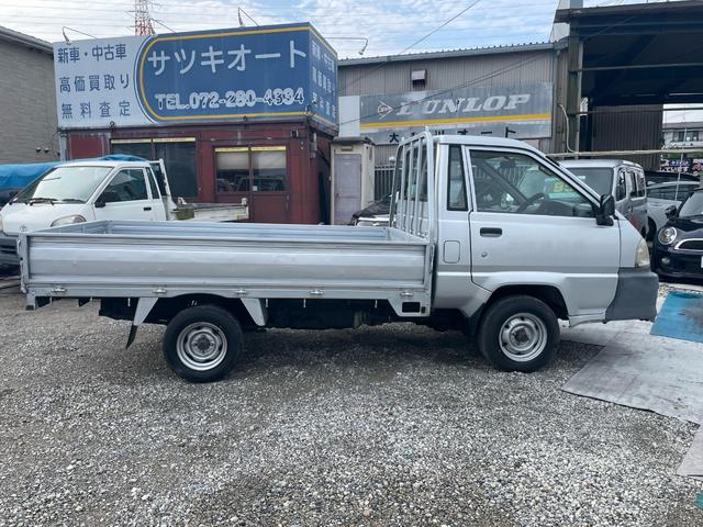 ライトエーストラック ロングSシングルジャストローDX ロングスチールデッキ 三方開 コラム5速MT 1t ABS 運転席エアバッグ エアコン パワステ ETC 3人乗り 取説 メンテナンスノート(7枚目)