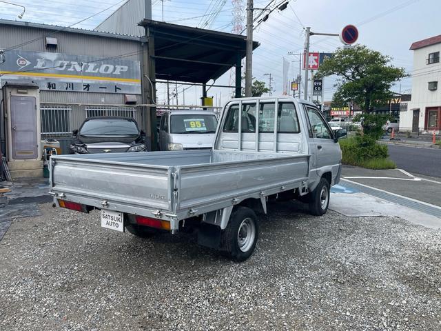 ライトエーストラック ロングSシングルジャストローDX ロングスチールデッキ 三方開 コラム5速MT 1t ABS 運転席エアバッグ エアコン パワステ ETC 3人乗り 取説 メンテナンスノート(9枚目)