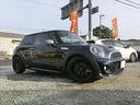 MINI ジョンクーパーワークス SONYポータブルナビ 6速AT ターボ 運転席&助手席エアバッグ ABS キーレスエントリー レザーシート センター2本出マフラー ユニオンジャックミラー(6枚目)