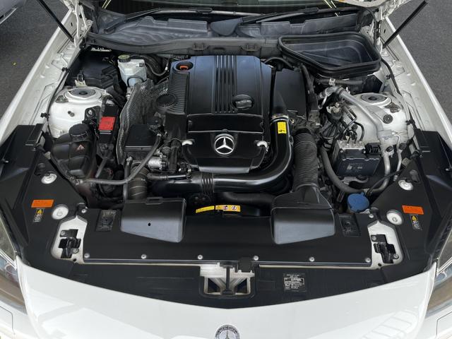 ＳＬＫ ＳＬＫ２００ＭＴ　ＡＭＧスポーツパッケージ　６速マニュアル・マジックスカイルーフ・電動ハードトップ・黒革シート・１８００ｃｃ・直４ターボ・純正ＨＤＤナビ・ＡＭＧ１８インチアルミホイール・シートヒーター（24枚目）