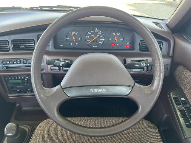 ブルーバード １８００ＸＥサルーン　１．８ＸＥサルーンＦ３０周年記念車・ワンオーナー車・純正５速マニュアル・修復歴無し・エアコン・パワステ・パワーウィンドウ・車速感応集中ドアロック（22枚目）