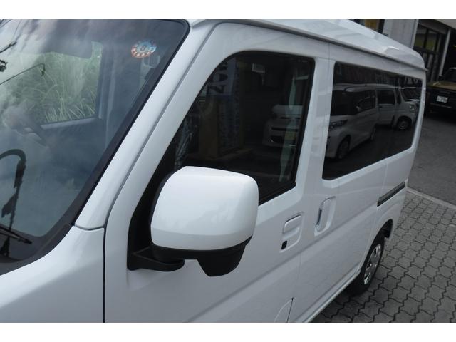 ハイゼットカーゴ クルーズターボ スマートアシスト 純正ナビ TV スマートキープッシュスタート 電動格納ドアミラー 届け出済未使用車 LED荷室灯 ホイルカバー パワーウインドウ プライバシーガラス アイドルストップ(3枚目)