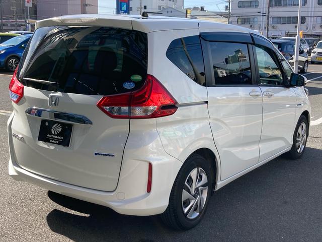 フリードハイブリッド ハイブリッド・Gホンダセンシング ホンダセンシング アダプティブクルーズコントロール Cパッケージ 6人乗り 両側パワースライドドア 純正ナビ フルセグTV バックカメラ ステアリングリモコン ビルトインETC LEDヘッドライト(55枚目)