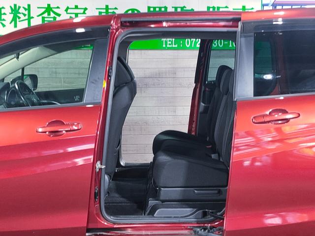 プレマシー ２０ＣＳ　禁煙車／地デジナビ／両側スライドドア／ＥＴＣ／７人乗り／フルオートエアコン／１５インチ社外アルミ（57枚目）