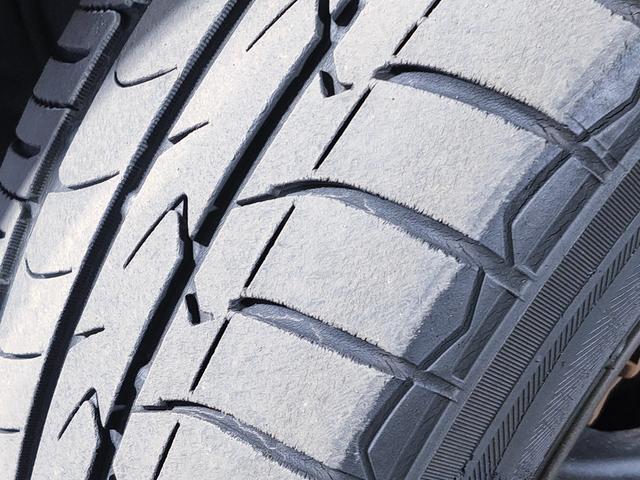 プレマシー ２０ＣＳ　禁煙車／地デジナビ／両側スライドドア／ＥＴＣ／７人乗り／フルオートエアコン／１５インチ社外アルミ（61枚目）