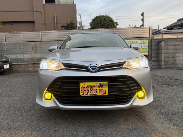 カローラフィールダー ハイブリッドG 純正SDナビ フルセグTV バックカメラ ブルーツゥース対応ナビ ETC車載器 黒革調シートカバー アイドリングストップ 横滑り防止装置 オートマチックハイビーム レーンアシスト 衝突軽減ブレーキ(2枚目)