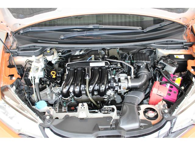 フィット ＲＳ　Ｌ１５Ｂ　１．５Ｌ直４ＤＯＨＣ　ｉ－ＶＴＥＣ　６Ｍ／Ｔ　１オーナー禁煙車修復歴無ＬＥＤヘッド＆リアコンビネーションランプ／オートライト／Ｆフォグ１６インチＡＷステンレス製スポーツペダルレッドステッチ／レッド柄入ブラックシートＭナビＤＴＶスマートキーシステム（9枚目）