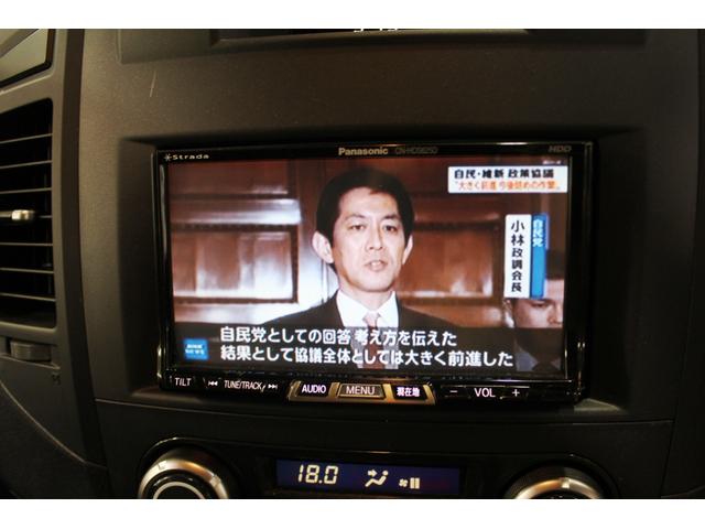 パジェロ ロング　リミテッドエディション４ＷＤ７人乗☆背面ハードカバー　☆パナソニックナビ／フルセグＴＶ／バックモニター＆アルパイン１０．１型フリップダウンモニター☆４×４エンジニアリング１６インチＡＷ☆ＨＩＤヘッド／オートライト／前後フォグ☆黒革調シートカバー☆ヒッチＭ（29枚目）