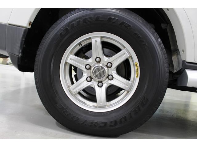 パジェロ ロング　リミテッドエディション４ＷＤ７人乗☆背面ハードカバー　☆パナソニックナビ／フルセグＴＶ／バックモニター＆アルパイン１０．１型フリップダウンモニター☆４×４エンジニアリング１６インチＡＷ☆ＨＩＤヘッド／オートライト／前後フォグ☆黒革調シートカバー☆ヒッチＭ（43枚目）