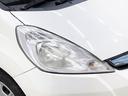 フィットハイブリッド ハイブリッド・１０ｔｈアニバーサリー　修復歴なし　バックカメラ　ＣＶＴ　オートエアコン　ＥＴＣ　アイドリングストップ　ハイブリッド　純正ホイールキャップ　チルトステアリング　シートリフター　電動格納ミラー　Ｗエアバッグ　ＡＢＳ（8枚目）