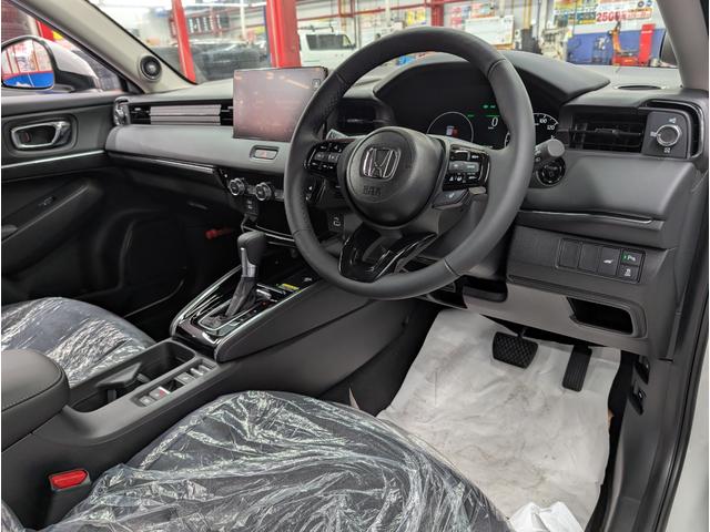 ヴェゼル e:HEV Z 登録済未使用車 マルチビューカメラ ホンダコネクトディスプレイ ETC2.0 ワイヤレス充電器 ホンダセンシング アクティブクルーズコントロール 車線維持支援システム アクティブドライビングビーム(21枚目)