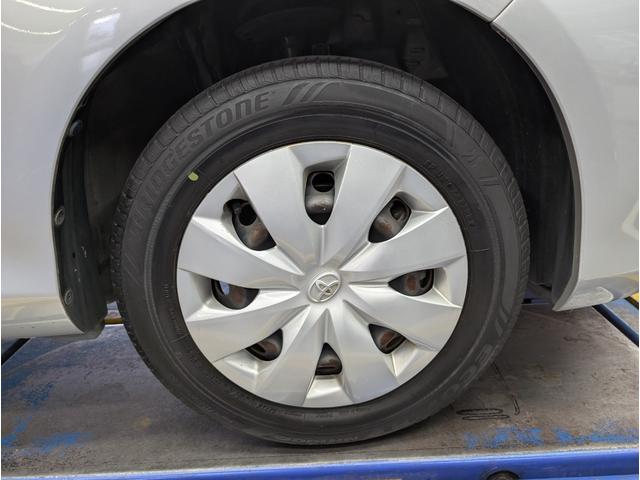 ヴィッツ Ｆ　キーレス　ＡＢＳ　電動格納ドアミラー　パワーウィンド　ＣＤオーディオ　運転席シートリフター　ＵＶカットガラス　プライバシーガラス　ＬＥＤリアコンビネーションランプ　アクセサリーソケット　パニティミラー（19枚目）