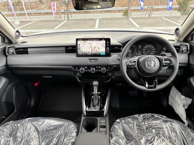 ヴェゼル ｅ：ＨＥＶ　Ｚ　登録済未使用車　ホンダコネクトナビ　全方位カメラ　ＥＴＣ２．０　ＬＥＤヘッドライト　パワーバックドア　前席シートヒーター　ステアリングヒーター　プレミアムオーディオ　ブラインドスポットモニター（33枚目）