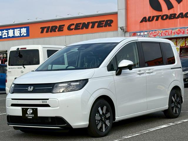 フリード e:HEVエアー EX 6人乗 登録済未使用車 衝突被害軽減ブレーキ 両側電動スライドドア LEDヘッドライト アダプティブクルーズ シートヒーター運転席助手席 ブラインドスポットモニター 15インチアルミ スマートキー2本(2枚目)