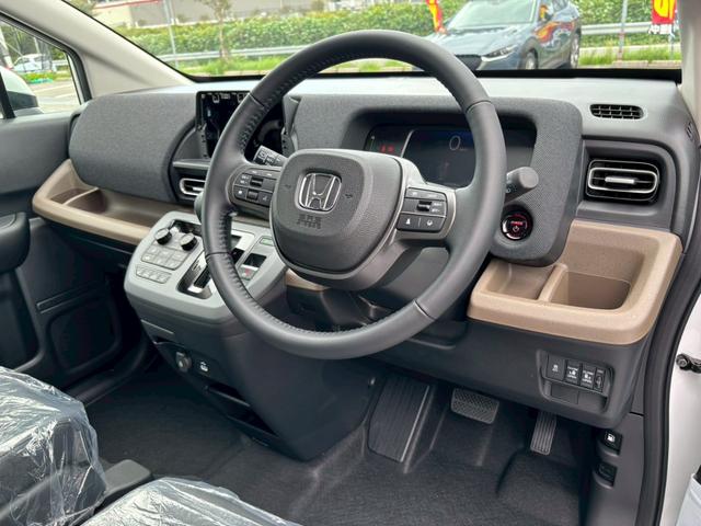 フリード e:HEVエアー EX 6人乗 登録済未使用車 衝突被害軽減ブレーキ 両側電動スライドドア LEDヘッドライト アダプティブクルーズ シートヒーター運転席助手席 ブラインドスポットモニター 15インチアルミ スマートキー2本(33枚目)