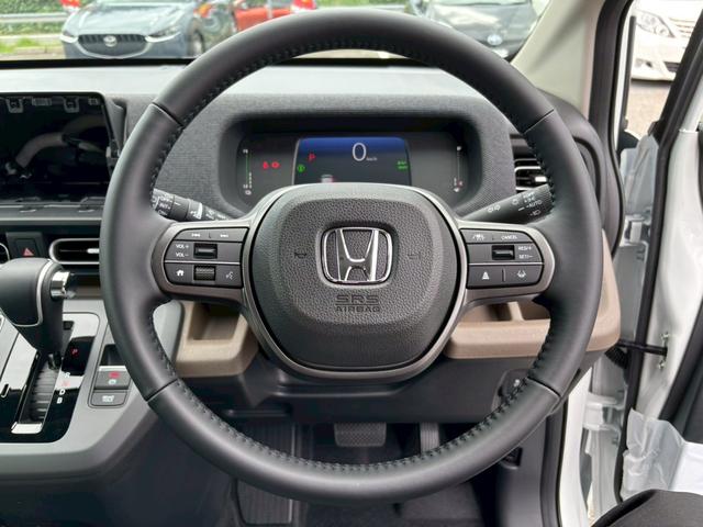 フリード e:HEVエアー EX 6人乗 登録済未使用車 衝突被害軽減ブレーキ 両側電動スライドドア LEDヘッドライト アダプティブクルーズ シートヒーター運転席助手席 ブラインドスポットモニター 15インチアルミ スマートキー2本(39枚目)