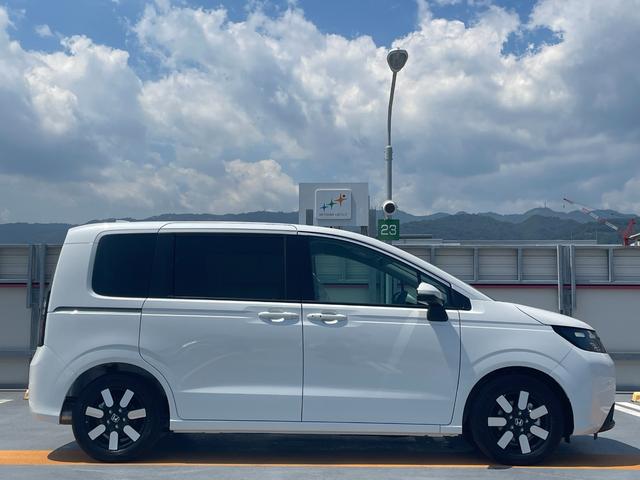 フリード e:HEVエアー EX 登録済未使用車 ホンダセンシング LEDヘッドライト 両側パワースライドドア シートヒーター リアクーラー バックカメラ アクティブクルーズコントロール スマートキー 15インチアルミホイル(8枚目)