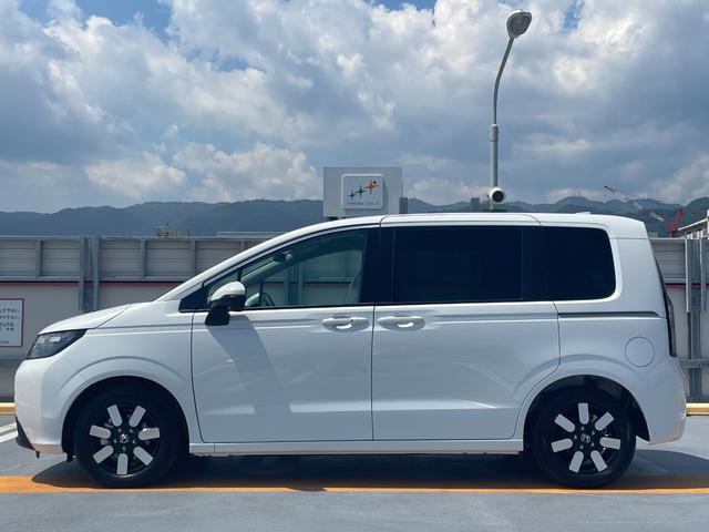 フリード e:HEVエアー EX 登録済未使用車 ホンダセンシング LEDヘッドライト 両側パワースライドドア シートヒーター リアクーラー バックカメラ アクティブクルーズコントロール スマートキー 15インチアルミホイル(15枚目)