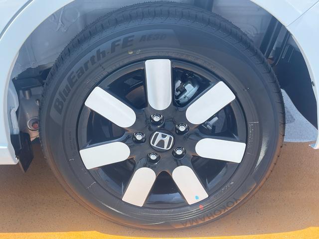 フリード e:HEVエアー EX 登録済未使用車 ホンダセンシング LEDヘッドライト 両側パワースライドドア シートヒーター リアクーラー バックカメラ アクティブクルーズコントロール スマートキー 15インチアルミホイル(24枚目)