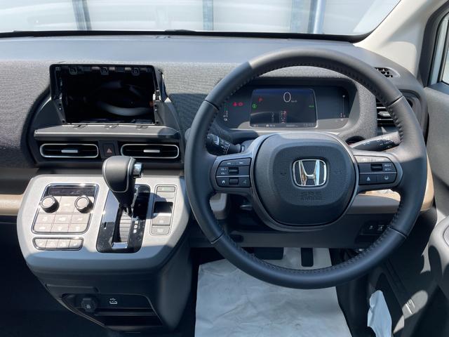 フリード e:HEVエアー EX 登録済未使用車 ホンダセンシング LEDヘッドライト 両側パワースライドドア シートヒーター リアクーラー バックカメラ アクティブクルーズコントロール スマートキー 15インチアルミホイル(29枚目)
