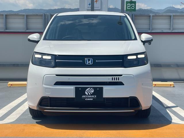 フリード e:HEVエアー EX 登録済未使用車 ホンダセンシング LEDヘッドライト 両側パワースライドドア シートヒーター リアクーラー バックカメラ アクティブクルーズコントロール スマートキー 15インチアルミホイル(2枚目)
