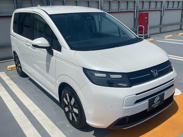 フリード e:HEVエアー EX 登録済未使用車 ホンダセンシング LEDヘッドライト 両側パワースライドドア シートヒーター リアクーラー バックカメラ アクティブクルーズコントロール スマートキー 15インチアルミホイル(7枚目)