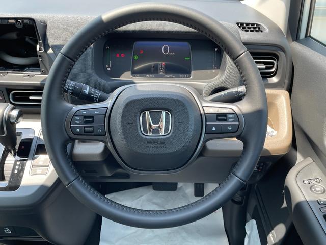 フリード e:HEVエアー EX 登録済未使用車 ホンダセンシング LEDヘッドライト 両側パワースライドドア シートヒーター リアクーラー バックカメラ アクティブクルーズコントロール スマートキー 15インチアルミホイル(30枚目)