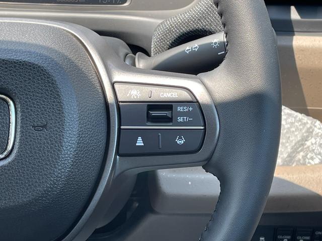 フリード e:HEVエアー EX 登録済未使用車 ホンダセンシング LEDヘッドライト 両側パワースライドドア シートヒーター リアクーラー バックカメラ アクティブクルーズコントロール スマートキー 15インチアルミホイル(33枚目)