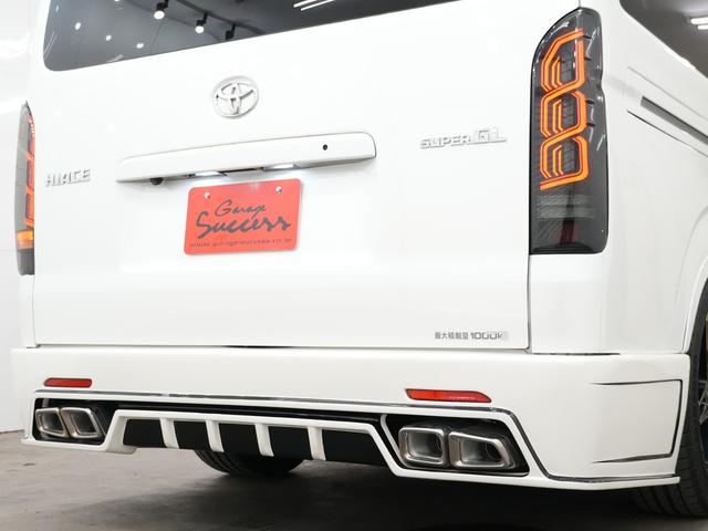 ハイエースバン スーパーGL ダークプライム GR8STYLEエアロ/ローダウン/RACINGTECHNOLOGY BONZO20インチAW/社外ヘッドライトライト/Bluetooth/バックカメラ/ETC/両側電動スライドドア/ベットキット(11枚目)