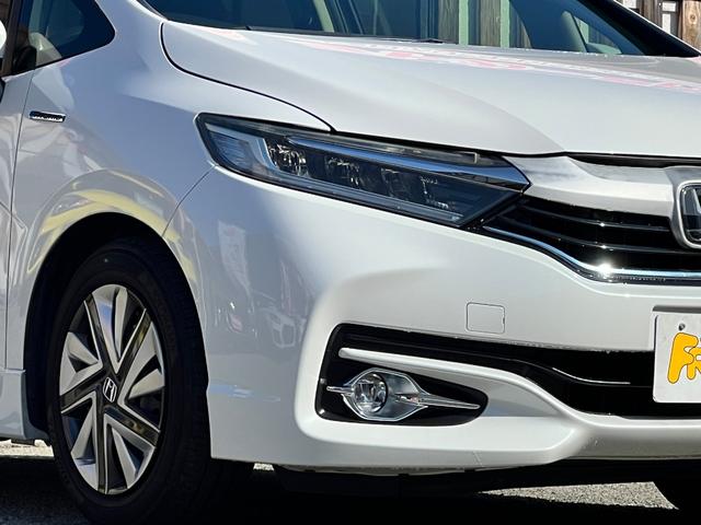 シャトル ハイブリッドＸ　ホンダセンシング　後期型　衝突軽減ブレーキ　９型ＴＶナビ　ＥＴＣ　バックカメラ　Ｂｌｕｅｔｏｏｔｈ　ドライブレコーダー　ＬＥＤヘッドライト　フォグライト　クルーズコントロール　シートヒーター　保証付（2枚目）