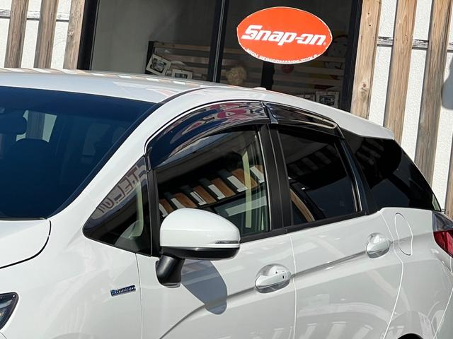 シャトル ハイブリッドＸ　ホンダセンシング　後期型　衝突軽減ブレーキ　９型ＴＶナビ　ＥＴＣ　バックカメラ　Ｂｌｕｅｔｏｏｔｈ　ドライブレコーダー　ＬＥＤヘッドライト　フォグライト　クルーズコントロール　シートヒーター　保証付（13枚目）