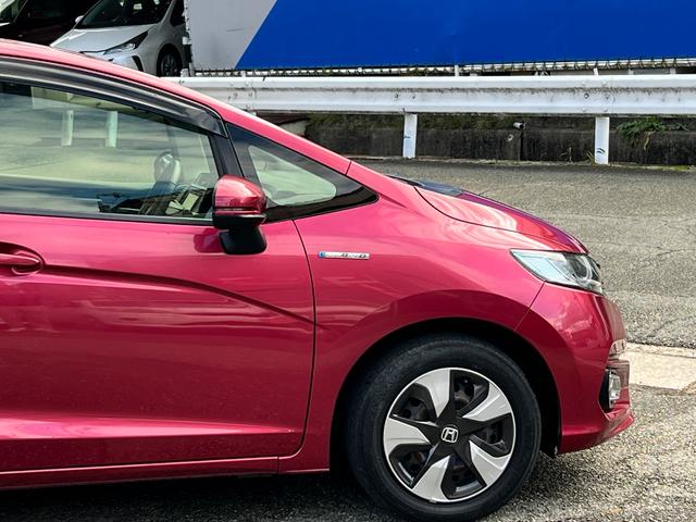 フィットハイブリッド Ｌ　ホンダセンシング　後期型　衝突軽減ブレーキ　ＴＶ　ナビ　ＥＴＣ　バックカメラ　Ｂｌｕｅｔｏｏｔｈ　ドライブレコーダー　ＬＥＤヘッドライト　フォグライト　クルーズコントロール　保証付（18枚目）