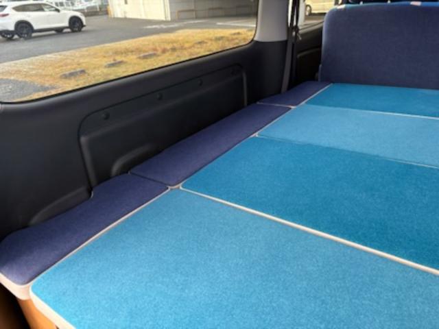 キャラバン グランドプレミアムGX ベッドキットシステム・サイドオーニング・ステアリングスイッチ(クルコン)・ローダウン・ショック・スタビ・16AW・Sマフラー・ナビTV(9インチ)・フリックダウン・スピーカー・Sコンシール・Sキャビ(49枚目)