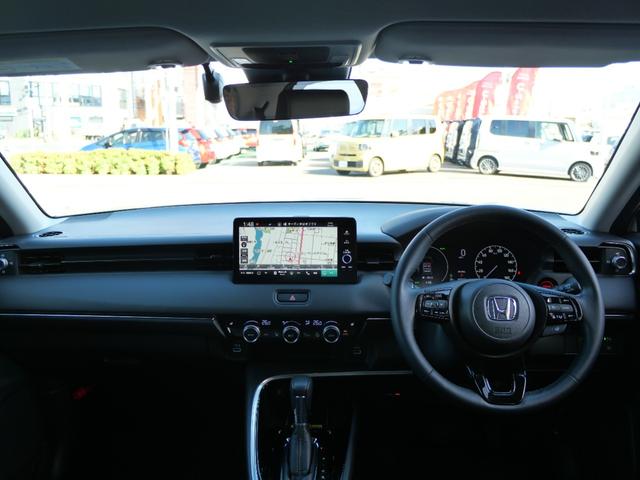 ヴェゼル ｅ：ＨＥＶＺ　ワンオーナー　ホンダセンシング　９インチナビ　バックカメラ　ＥＴＣ２．０　ワイヤレス充電器　ドラレコ前後　シートヒーター　ハンドルヒーター　減速セレクター　パワーテールゲート　ＬＥＤヘッドライト（3枚目）