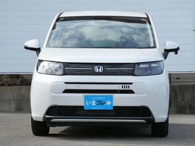 フリード e:HEVエアーEX 登録済未使用車 【いまコレ+】新品ナビ、新品マット ホンダセンシング 9インチナビ バックカメラ ETC2.0 2列目USB充電器 両側電動スライド シートヒーター 電子パーキング LEDヘッドライト(5枚目)